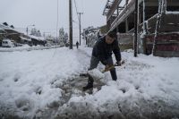 Bariloche cubierto de nieve: las postales de un día de alerta meteorológica