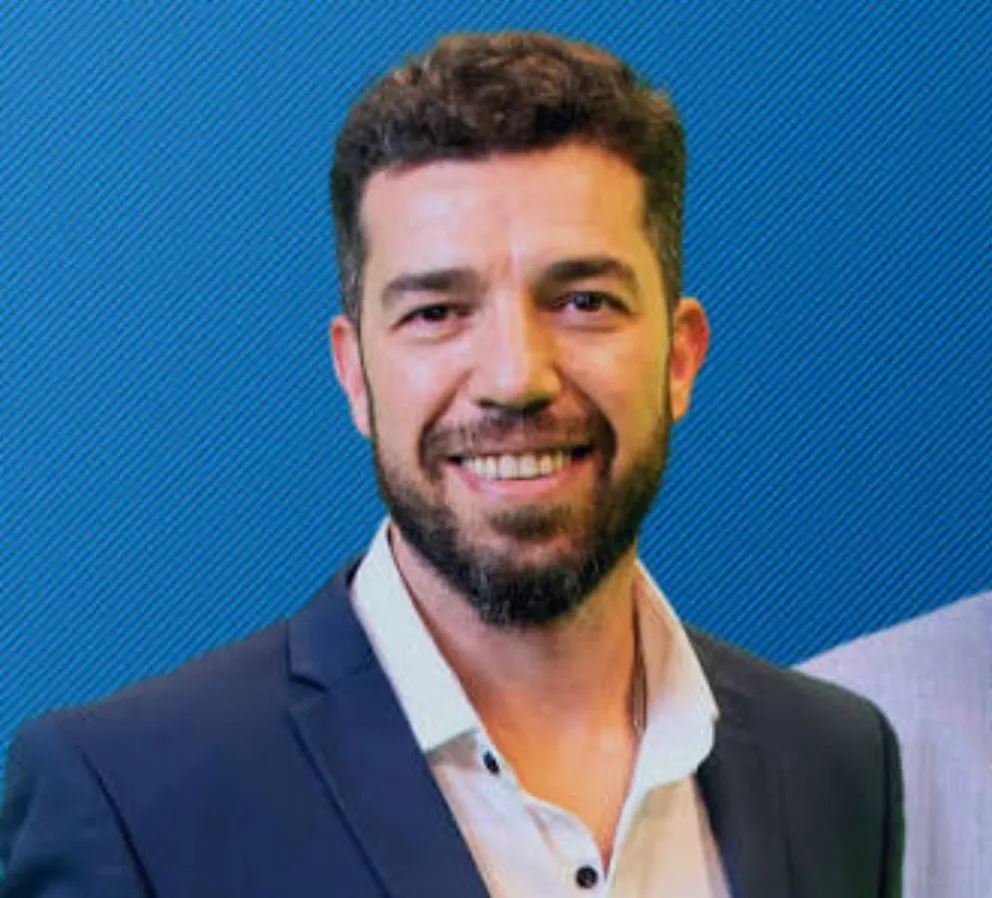 Claude Staicos.